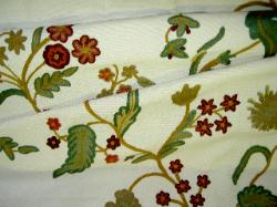 Folded fabric image of wool linen embroidered interior decorating fabric at store.schindlersfabrics.com
