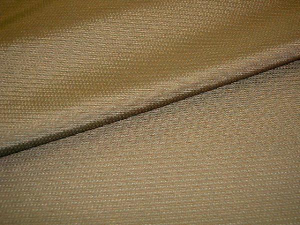 Closeup folded view of Drapery Weight Textured Brown with Green Polyester Workroom Fabric Remnant