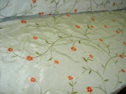 Embroidered Floral Drapery Sheer at store.schindlersfabrics.com