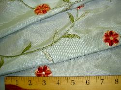 close up oattern and textue image of embroidery fabric at Schindlers Fabrics