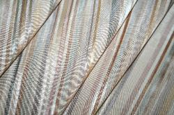 Folded and draped view of Edgar Pattern Paris Color Stucco Multipurpose Fabric M122905-001