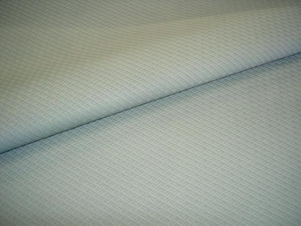 Closeup folded Fabric Shop Special Basket Weave Design Central Park Upholstery Vinyl Light Gray by the yard