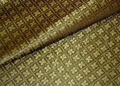 Closeup folded view of Our Fabric Store Decorator Vanguard 555 Color Bronze on Sale by the yard