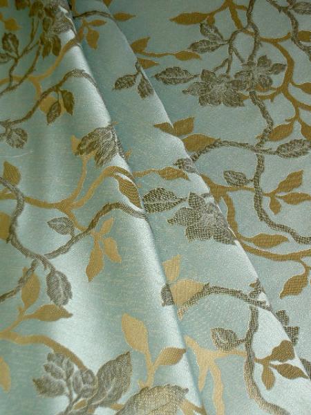 Draped picture of Premium Upholstery Weight Jacquard Brown and Gold leaf Floral on Aqua Workroom Fabric Remnant