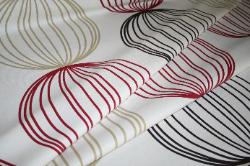 Folded Fabric View of this all purpose decorator's fabric at Schindler's Fabric, Prestigious Textiles Pattern Orbital Color Ruby Interior Decorating Fabric