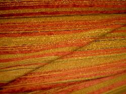 Folded Fabric view of chenille striped Swavelle fabric at store.schindlersfabrics.com